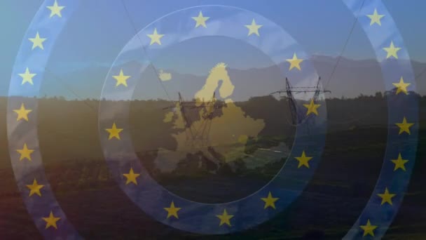 欧州連合の旗の星のアニメーションとフィールド内の電気パイロン上のマップ 欧州連合のエネルギーと経済の概念デジタルで生成されたビデオ — ストック動画