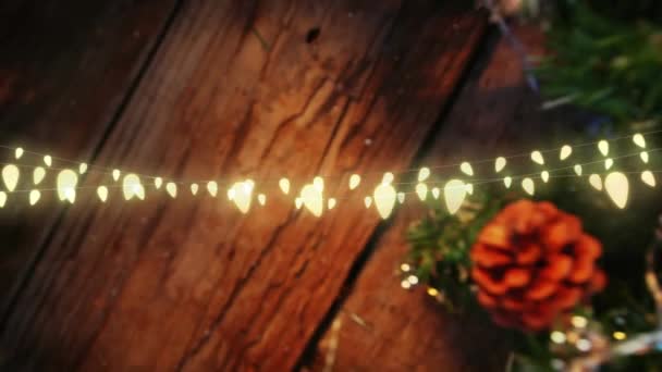 Animación Luces Cuerda Sobre Corona Navidad Decorada Navidad Felicitaciones Estacionales — Vídeo de stock