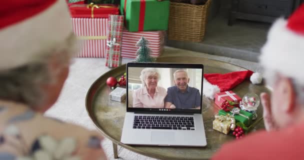 Senior Caucasian Couple Santa Hats Using Laptop Christmas Video Call — Stock Video