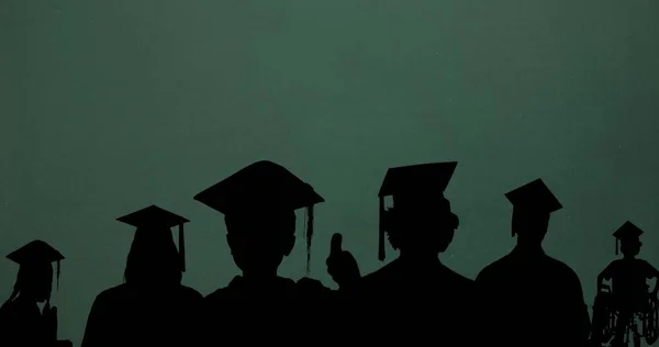 Silhouette Male Female Students Wearing Mortarboards Green Background Copy Space — Stock Photo, Image