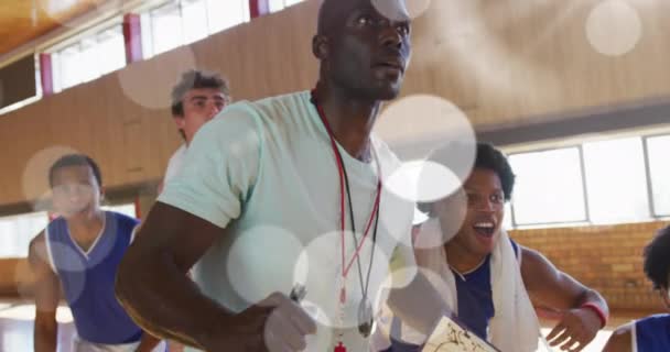 Animation Light Spots Diverse Male Basketball Team Screaming Joy Global — Stock Video