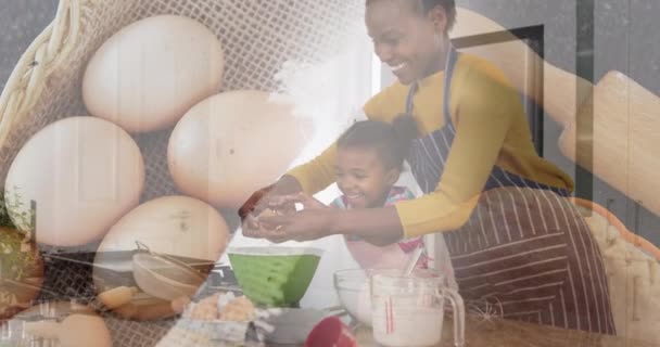 Animation Der Glücklichen Afrikanisch Amerikanischen Mutter Und Tochter Beim Kochen — Stockvideo