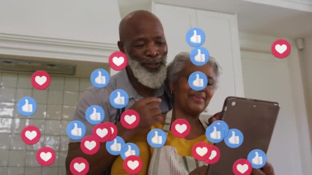 Animation Icônes Médiatiques Sur Heureux Couple Afro Américain Aide Une — Video