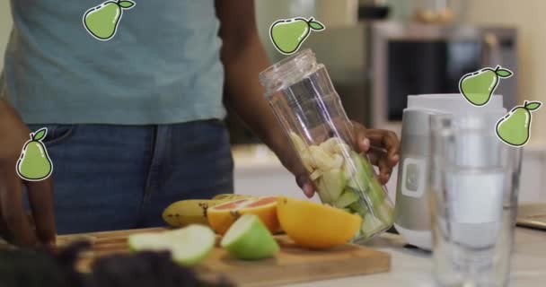 Animation Einer Afrikanisch Amerikanischen Frau Die Gesunde Getränke Über Birnen — Stockvideo