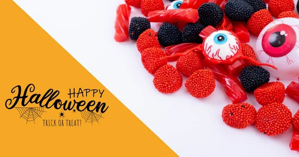 Imagem Composta Digital Cumprimentos Halloween Felizes Com Guloseimas Doces Assustadoras — Fotografia de Stock