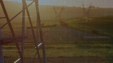 Veri işleme ve peyzaj üzerindeki elektrik direkleriyle karelerin animasyonu. küresel bağlantılar, teknoloji, veri işleme ve dijital arayüz konsepti dijital olarak oluşturulmuş video.