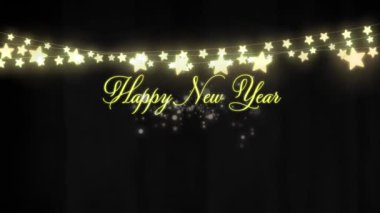 Mutlu bayramlar metni ve siyah arka planda noel ışıklarının canlandırılması. Yeni yıl, Noel, gelenek ve dijital olarak üretilen kutlama konsepti.