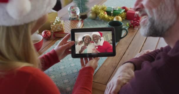 Caucasian Couple Santa Hats Using Tablet Christmas Video Call Couple — Stock Video