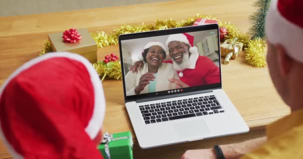 Caucasian Father Son Santa Hats Using Laptop Christmas Video Call — Stock Video