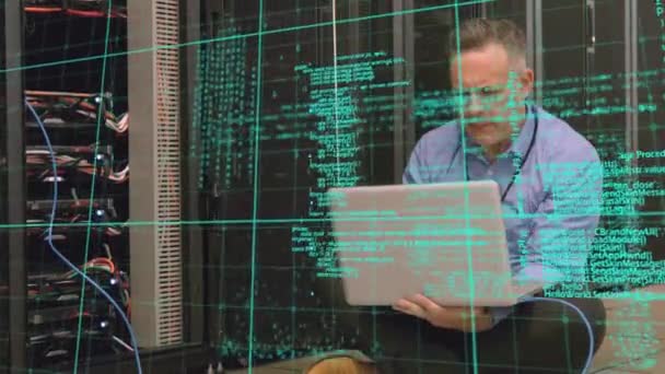 Animation Data Processing Caucasian Man Using Laptop Server Room Global — Stockvideo