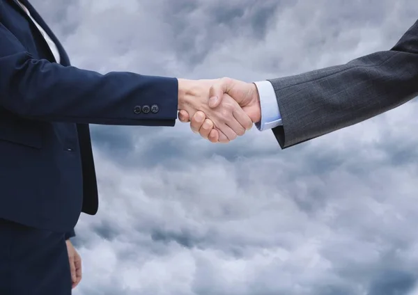 Mid Section Two Businessmen Shaking Hands Clouds Sky Global Business — Stock Photo, Image