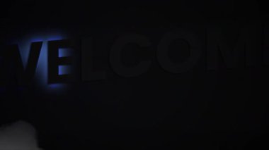 Hoş geldin metninin dumanla canlandırılması. Sosyal medya ve iletişim arayüzü kavramı dijital olarak oluşturulmuş video.