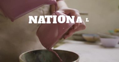 Ulusal hobi ayının animasyonu beyaz adamın çanak çömlek kurma ellerinin üzerine yazılmış. hobi ve kutlama konsepti dijital olarak oluşturulmuş video.