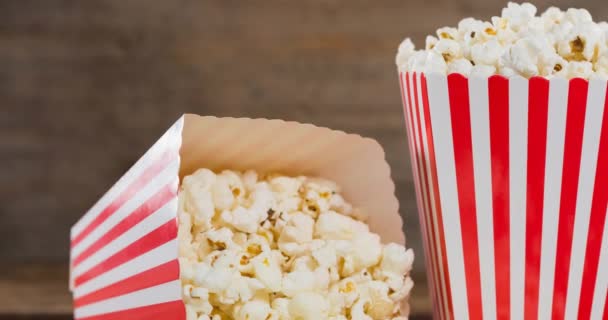 Egy Doboz Popcorn Animációja Fafalon Nemzeti Popcorn Nap Ünnepi Koncepció — Stock videók