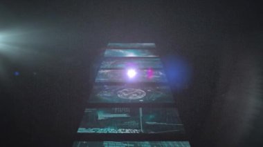 Animation of digital screens and light trails on black background. global business and digital interface concept digitally generated video.