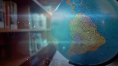 Animation of networks of connections over globe in classroom. global education, learning and connections concept digitally generated video.