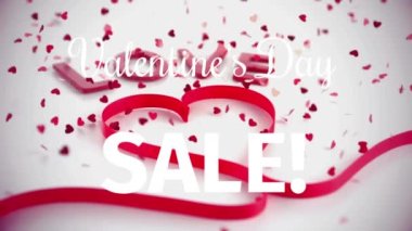 Kırmızı kalpler yerine sevgililer günü satışı metninin animasyonu. Sevgililer günü satışları ve dijital olarak üretilen video konsepti.