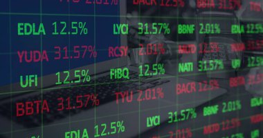 Image of financial data processing over laptop and payment terminal. global online shopping, business, finances, data processing and digital interface concept digitally generated image.