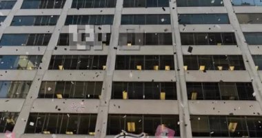 Animation of wow text, social media icons and confetti over cityscape. global social media and digital interface concept digitally generated video.