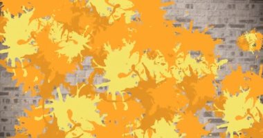 Animation of multiple colorful stains over brick wall. hobby and lifestyle concept digitally generated video.