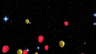 Animation of flying colorful balloons and lights over black background. party and celebration concept digitally generated video.