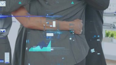 Animation of financial data processing over diverse business people embracing. global business, finances, connections and digital interface concept digitally generated video.