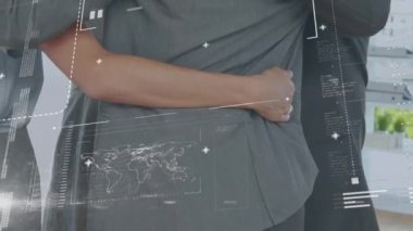 Animation of financial data processing over diverse business people embracing. global business, finances, connections and digital interface concept digitally generated video.