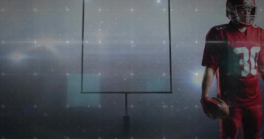 Toplu erkek Amerikan futbolcusu üzerinden veri işleme animasyonu. spor ve kutlama konsepti dijital olarak oluşturulmuş video.