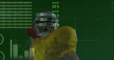 Amerikan erkek futbolcunun top atması üzerine veri işleme animasyonu. spor ve kutlama konsepti dijital olarak oluşturulmuş video.