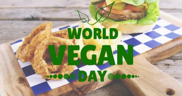 Animación Texto Del Día Vegano Mundial Sobre Hamburguesa Fresca Día — Vídeos de Stock