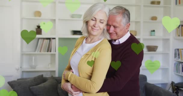 高年级的高加索夫妇拥抱时的心形动画 派对及庆祝活动概念数码影片 — 图库视频影像