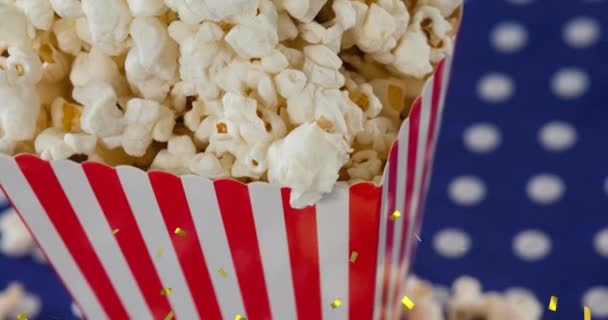 Animation Von Goldenem Konfetti Über Einer Popcorn Schachtel Popcorn Tag — Stockvideo