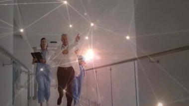 Hastanedeki çeşitli doktorlarla olan bağlantıların animasyonu. küresel tıp, sağlık ve teknoloji konsepti dijital olarak üretilen video.