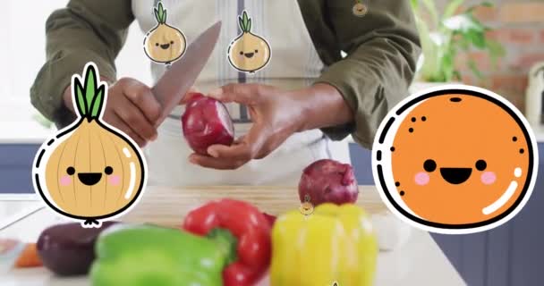 Animation Icônes Alimentaires Sur Homme Afro Américain Coupant Des Légumes — Video