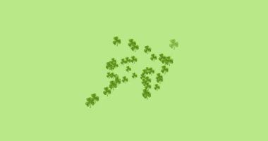 Yeşil arka planda oluşan çoklu yonca yapraklarının dijital animasyonu. Mutlu Aziz Patrick bayramı kutlaması..