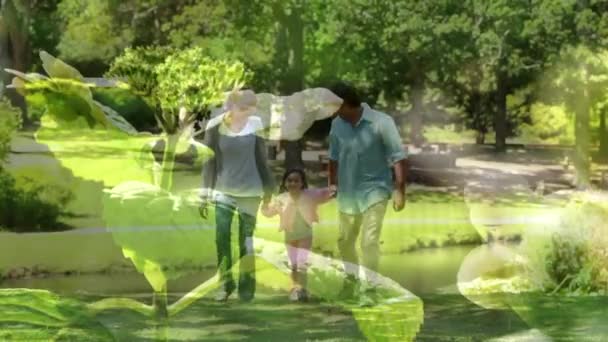 女儿在大自然中行走的父母身边的灯光录像 全国步行日 健康的生活方式数字化生成视频 — 图库视频影像