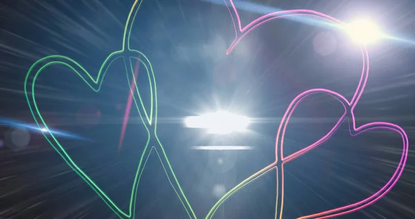 Cyfrowy Obraz Jasnej Plamy Światła Neonowych Sercach Ciemnym Tle Walentynkowa — Zdjęcie stockowe