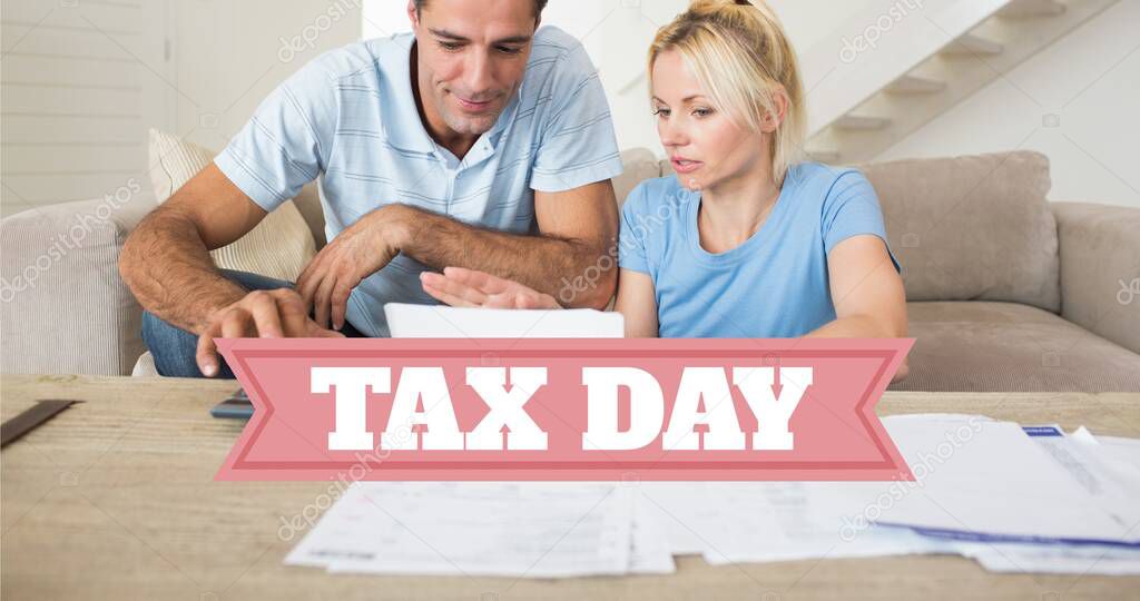 Caucasian couple discussing over financial bills while filling returns behind tax day text. unaltered, people, emotions and finance concept.