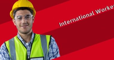 Uluslararası işçi günü metni üzerine gülümseyen beyaz erkek işçinin animasyonu. Uluslararası İşçiler Günü ve dijital olarak üretilen video konsepti.
