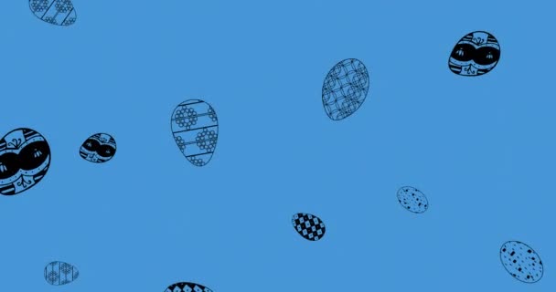 彩蛋的动画落在蓝色背景上 复活节及数码影片制作的庆祝概念 — 图库视频影像