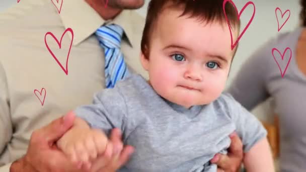 Animação Corações Caindo Sobre Pai Caucasiano Feliz Com Bebê Família — Vídeo de Stock