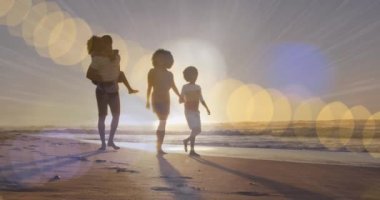 Afro-Amerikan ailesinin birlikte yürüdüğü ışık noktalarının animasyonu. yürüyüş günü ve dijital olarak oluşturulan video konsepti.