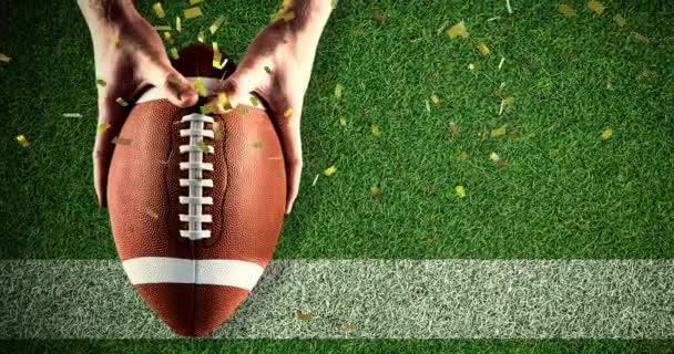 在体育场拿着橄榄球的男子身上 闪烁着金冠的动画 以数码方式制作的比赛 体育及竞争概念短片 — 图库视频影像