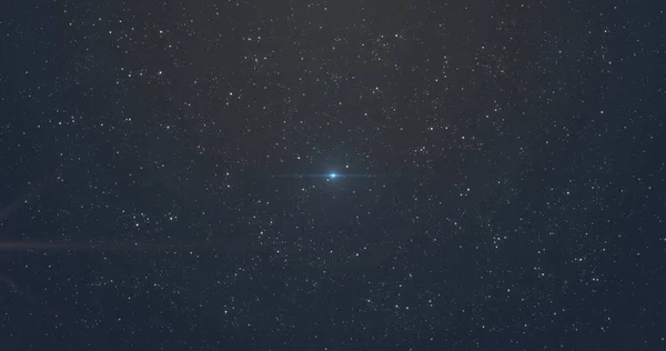 Fénylő Kék Narancssárga Fény Képe Fényfoltok Csillagok Között Háttérben Tér — Stock Fotó