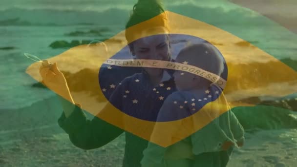 Animation Flagga Brazil Över Glad Kaukasiska Mor Med Barn Blåser — Stockvideo
