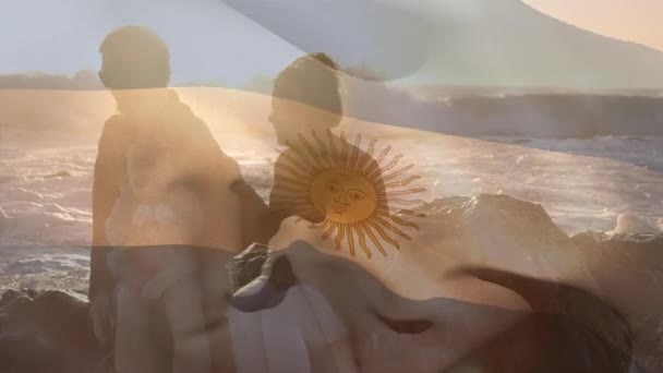 Animation Drapeau Argentine Sur Les Parents Caucasiens Avec Enfant Plage — Video