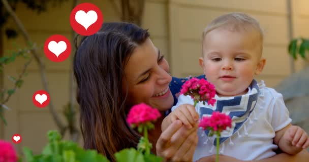 Animación Iconos Del Corazón Sobre Madre Caucásica Con Bebé Concepto — Vídeos de Stock