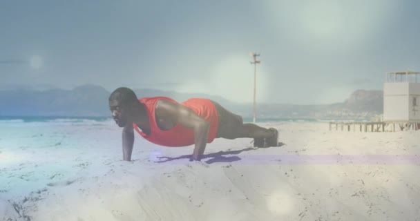 Animacja Miejsc Nad Afrykańskim Amerykaninem Ćwiczącym Plaży Koncepcja Zdrowia Sprawności — Wideo stockowe
