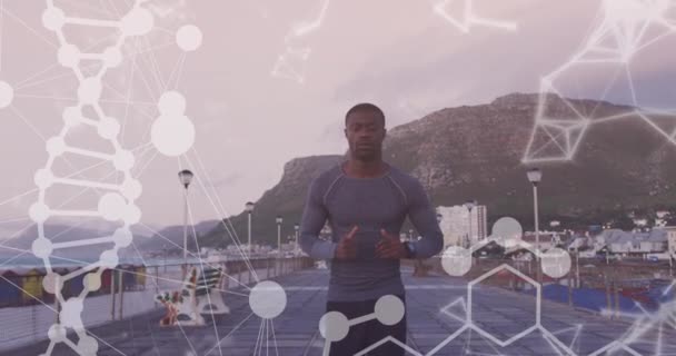 Анимация Форм Цепочки Днк Над Африканским Американцем Бегущим Набережной Здоровье — стоковое видео