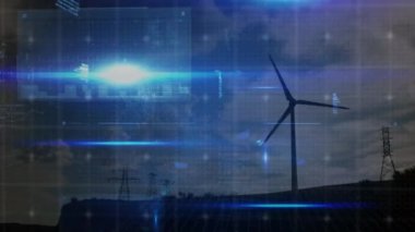 Rüzgar türbini ve sütunların üzerindeki veri işleme ve ışık izlerinin animasyonu. küresel teknoloji ve veri işleme kavramı dijital olarak oluşturulmuş video.